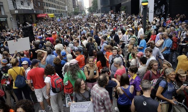 Thousands march in New York City, around globe over climate change