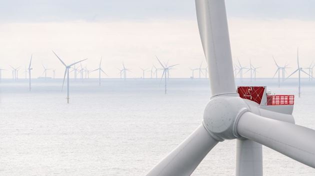 The first wind turbine rises at the Hollandse Kust Noord offshore wind farm