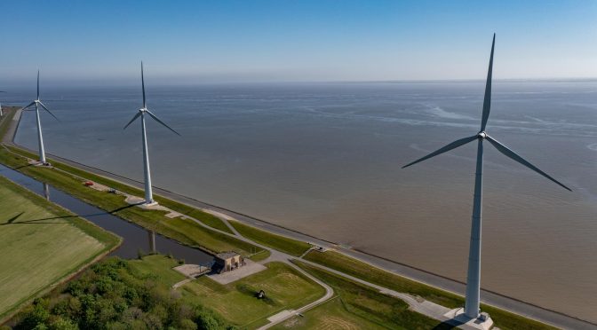 RWE operates wind turbines on a dike